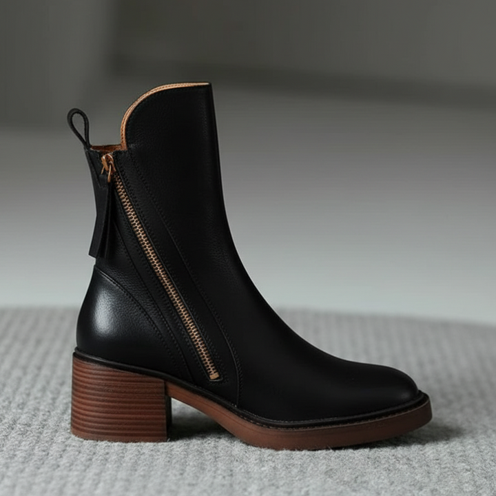 Judy™ | Black leather boots with a comfortable heel, elegant and timeless